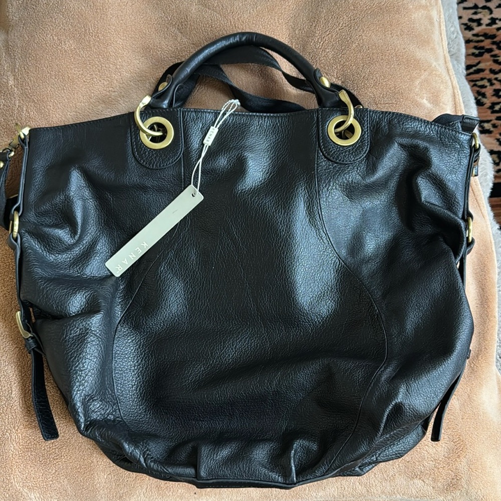 Black leather shoulder bag with cross body strap by KENAR